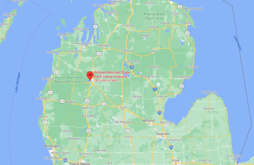 Map showing the location of William Mitchell State Park Campground in Michigan, near the center of the state.