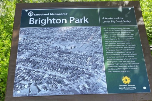 Sign about Brighton Park, highlighting its role in the Lower Big Creek Valley and community restoration efforts.