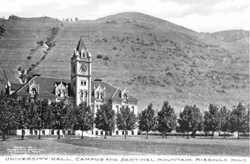 Historic black-and-white photo of University Hall, with Sentinel Mountain in the background, Missoula, Montana.