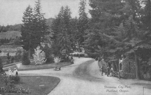 Historic black-and-white photo of a winding driveway in City Park, Portland, surrounded by trees and park visitors.