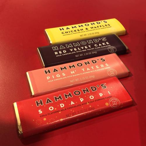 Four colorful chocolate bars from Hammond's: Chicken & Waffles, Red Velvet Cake, Pigs N' Taters, and Soda Pop.