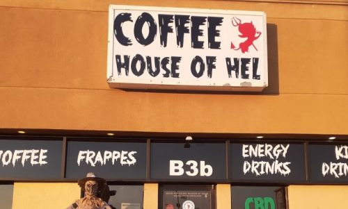 A quirky coffee shop named "Coffee House of Hel" with a skeleton holding a sign for CBD coffee.