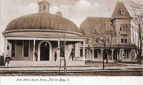 Historic black-and-white photo of Park Hotel and Round House in Put-in-Bay, Ohio, featuring Victorian architecture.