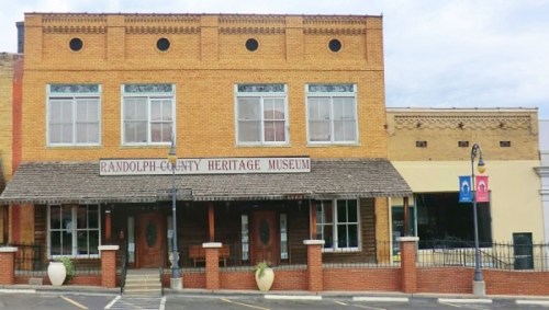 Exterior of the Randolph County Heritage Museum, featuring brick architecture and a welcoming entrance.