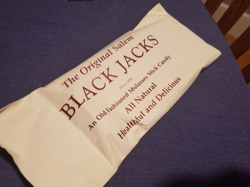 A package of Black Jacks, an old-fashioned molasses stick candy, labeled as all-natural and healthy.