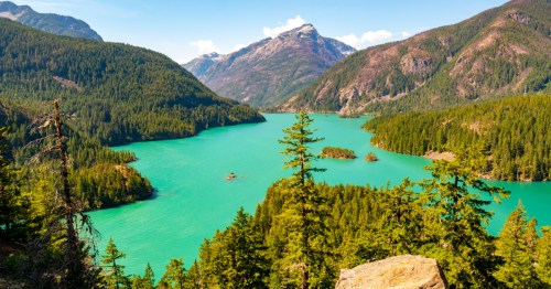 An aerial view of Diablo Lake in Washington State on a clear, summer day.