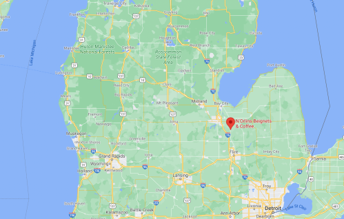 Map of Michigan highlighting the location of "N'Chic Beggars & Coffee" with surrounding areas.