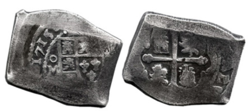 Two silver coins with intricate designs and inscriptions on both sides, showcasing historical currency.