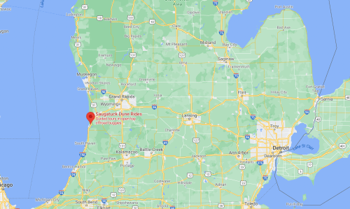 Map showing southwestern Michigan, highlighting Saugatuck Dune Rides near Lake Michigan.