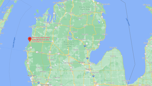 Map showing Michigan with a red marker indicating the location of Demerse Manor Bed & Breakfast Inn.