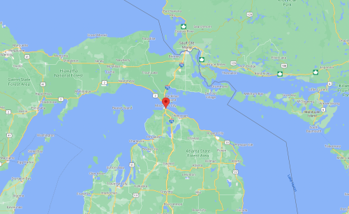 Map showing a location near the Straits of Mackinac, with surrounding water and land features.