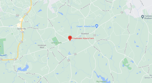 Map showing the location of Creekwater Alpaca Farm, surrounded by green areas and nearby roads.