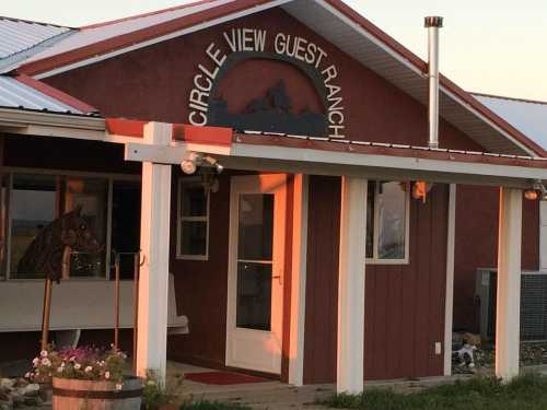 A rustic guest ranch with a sign reading "Circle View Guest Ranch" and a horse sculpture by the entrance.