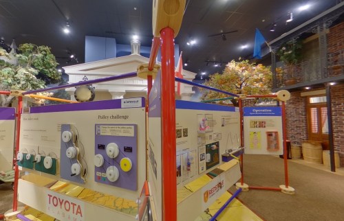 Interactive exhibit featuring safety challenges and educational displays, with colorful panels and a playful environment.