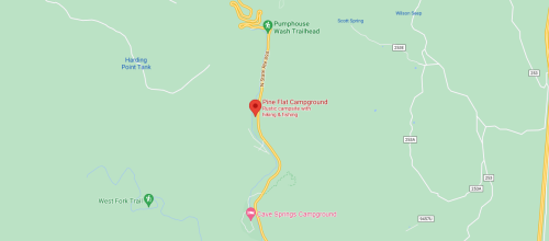 Map showing Pine Flat Campground and Cave Springs Campground, with nearby hiking and fishing trails.