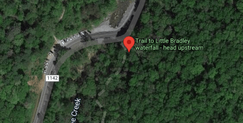Map view showing a trail to Little Bradley Waterfall, surrounded by dense greenery and a nearby road.