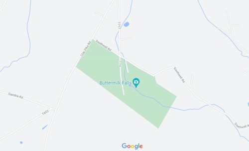 Map showing the location of Buttermilk Falls, with surrounding roads and green park area highlighted.