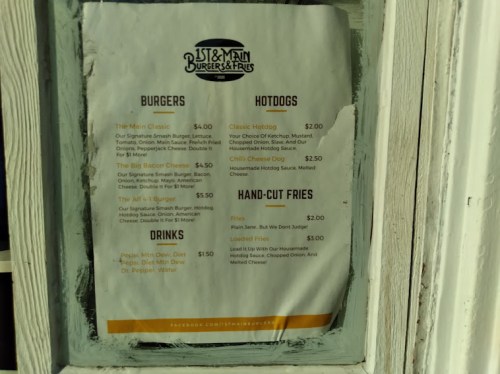 Menu for 31st & Main Burgers & Fries featuring burgers, hotdogs, hand-cut fries, and drinks with prices listed.