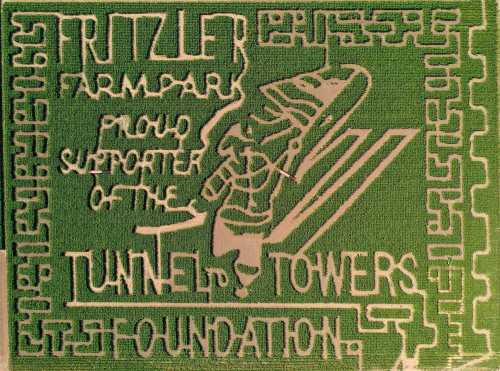 A green maze design featuring "Stritzler Farm Park" and "Tunnel to Towers Foundation" with a character holding a flag.