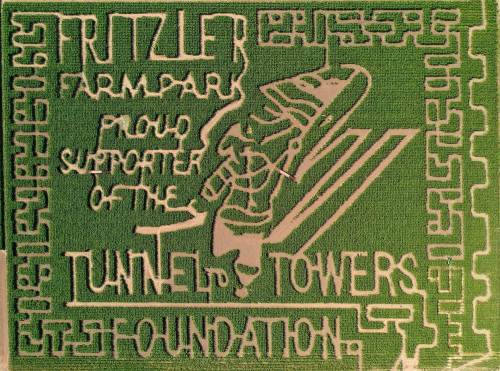 A green maze design featuring "Stritzler Farm Park" and "Tunnel to Towers Foundation" with a character holding a flag.