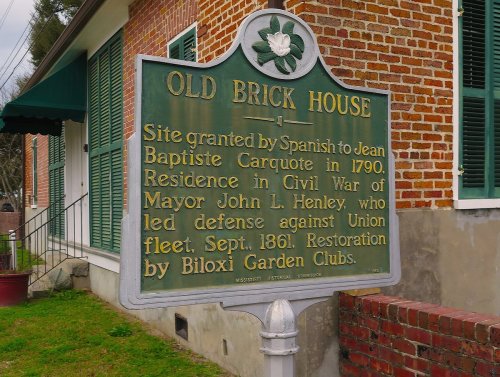 Historical marker for the Old Brick House, detailing its significance and restoration by Biloxi Garden Clubs.