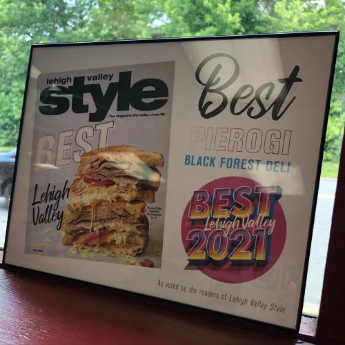 Framed magazine cover featuring a sandwich and awards for "Best Pierogi" and "Best of Lehigh Valley 2021."