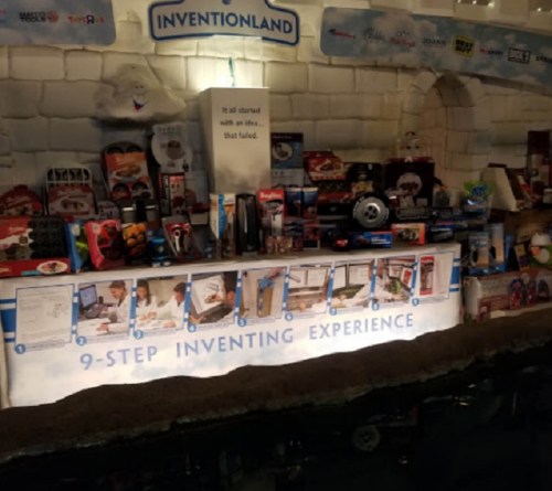 Display of various toys and inventions at Inventionland, featuring a 9-step inventing experience.