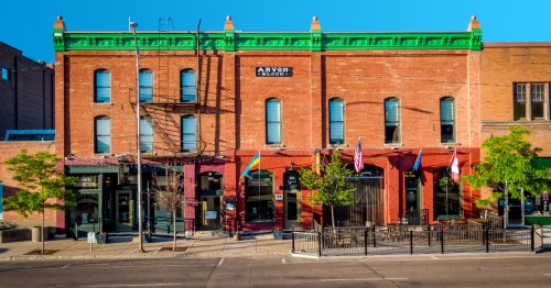 The brick exterior of the historic Hotel Arvon, a boutique hotel in Great Falls, Montana.