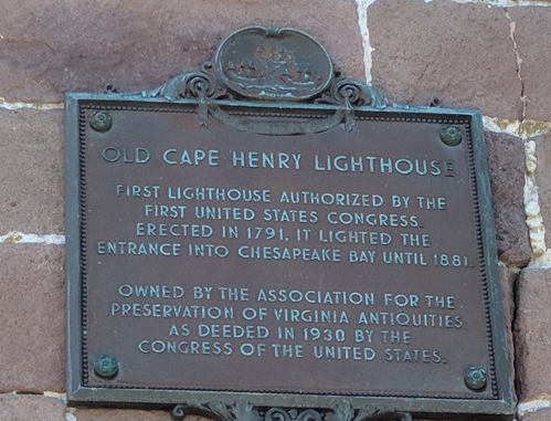 Plaque detailing the history of the Old Cape Henry Lighthouse, established in 1791 and preserved since 1930.