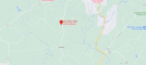 Map showing the location of Lily Creek Lodge near Aurora, with nearby roads and landmarks.