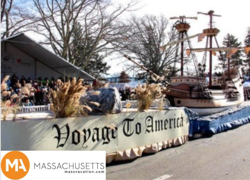 A parade float featuring a ship model with "Voyage To America" banner, surrounded by spectators and decorations.