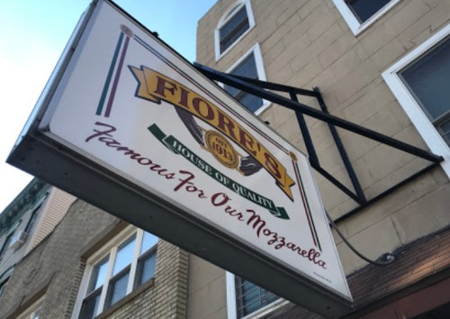 Sign for Fiore's House of Quality, established in 1913, known for its mozzarella.