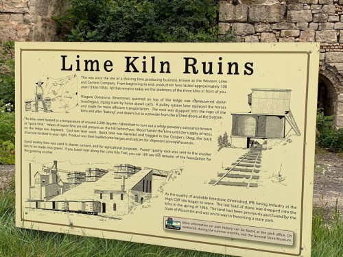 Sign detailing the Lime Kiln Ruins, highlighting its history and significance in the lime production industry.