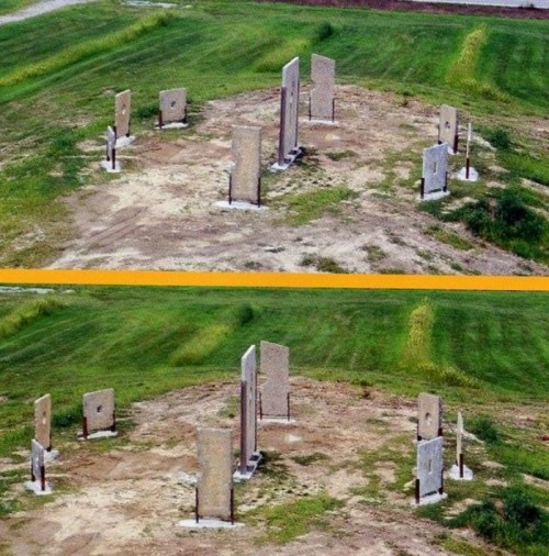 Aerial view of a stone circle with several upright stones on a grassy field, divided into two sections.