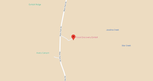 Map showing the location of the Fossil Discovery Exhibit, surrounded by natural features and roads.