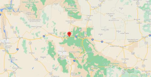 Map showing a location marked with a red pin in central Arizona, near the Grand Canyon National Park.