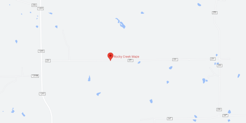 Map showing the location of Rocky Creek Maze, surrounded by open land and small water bodies.