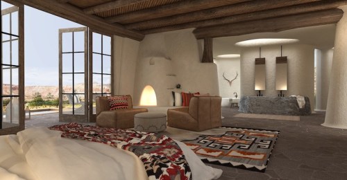 A spacious, modern bedroom with large windows, cozy seating, and stylish decor, featuring natural light and scenic views.