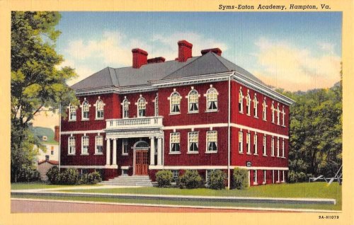 A vintage postcard of Sym's-Eaton Academy, a red brick building with white accents, surrounded by trees in Hampton, Virginia.