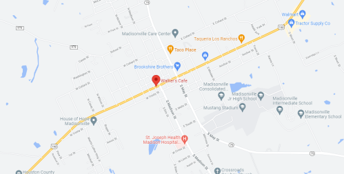 Map showing a section of Madisonville, highlighting Walker's Café and nearby landmarks.
