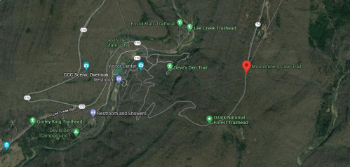 Map showing the location of Moonshiners Cave Trail near Devil's Den State Park and Ozark National Forest.