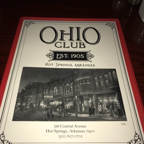 Menu cover for the Ohio Club, established in 1905, featuring a historic image of Hot Springs, Arkansas.