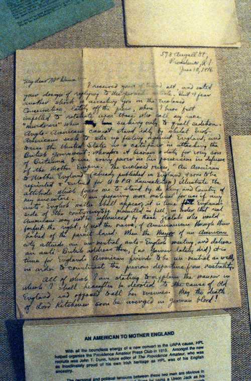 A handwritten letter dated June 1918, with faded ink on aged paper, displayed on a textured surface.