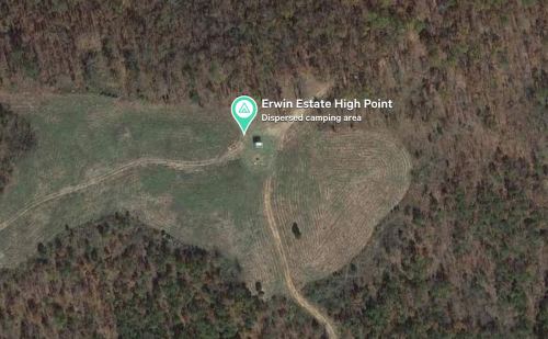 Aerial view of Erwin Estate High Point, showing a dispersed camping area surrounded by wooded terrain.