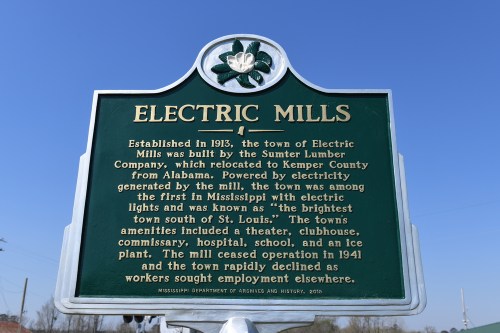 Historical marker for Electric Mills, Mississippi, detailing its establishment, amenities, and decline in 1941.