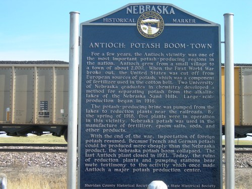 Historical marker about Antioch, Nebraska, highlighting its potash production and significance in the early 20th century.