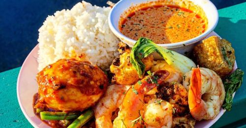 Closeup of a seafood and rice dish served at Oma's Hideaway, a South Asian restaurant in Portland, Oregon