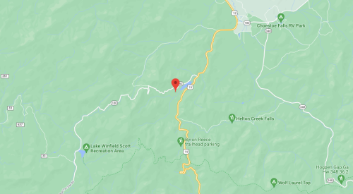 Map showing a mountainous area with roads, parks, and a marked location near Helton Creek Falls.