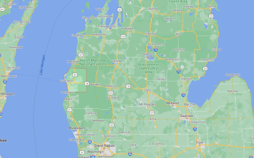 Map of northern Michigan, highlighting areas like Manistee National Forest and surrounding regions.