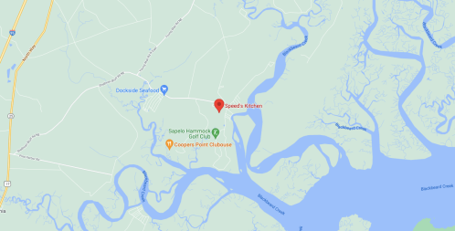 Map showing the location of Speed's Kitchen near waterways and golf clubs in a rural area.